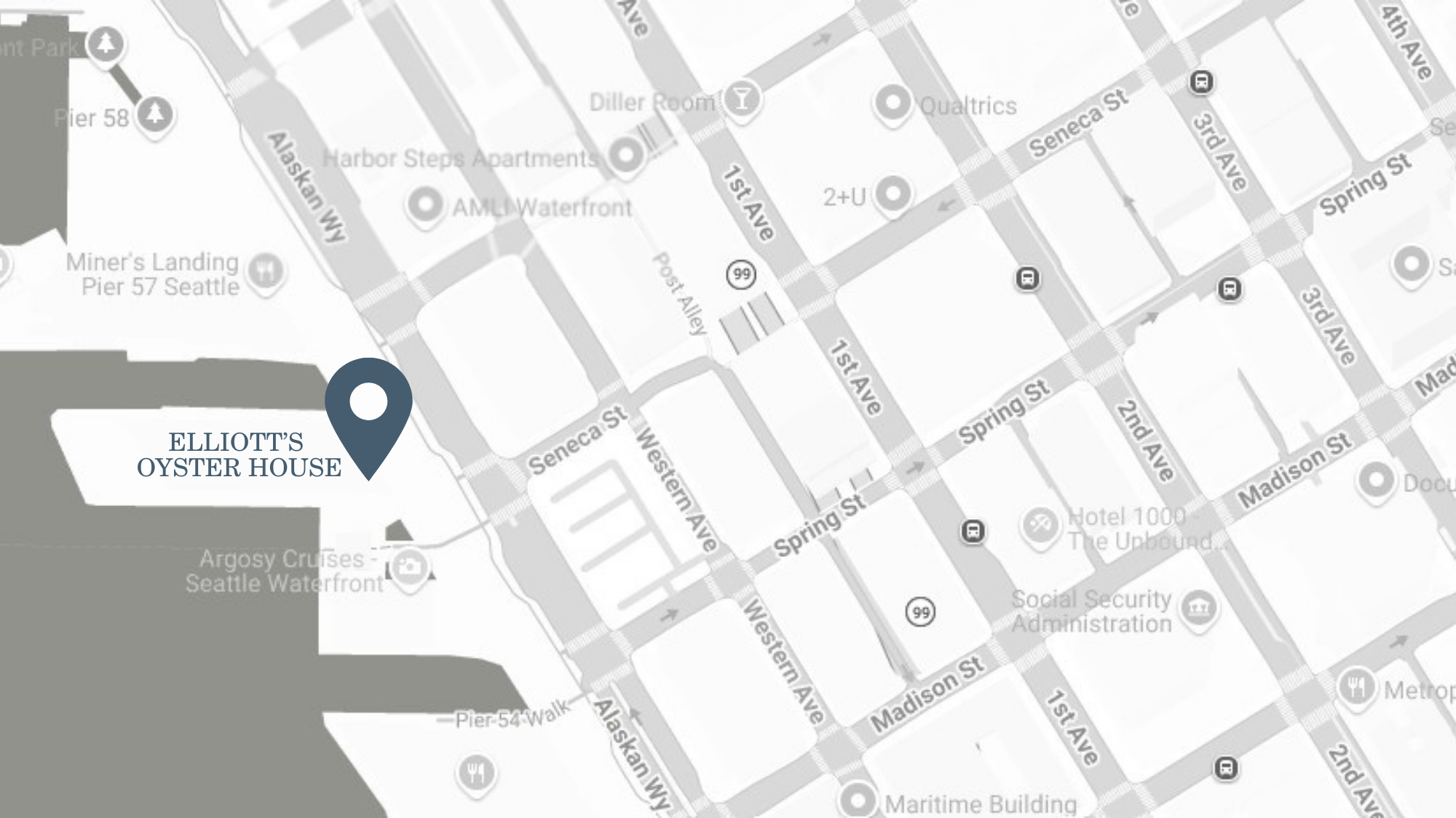 Map showing the location of Elliott’s Oyster House in Seattle, marked with a blue pin near the waterfront on Alaskan Way, close to the intersection with Seneca Street. Nearby streets and landmarks are labeled.